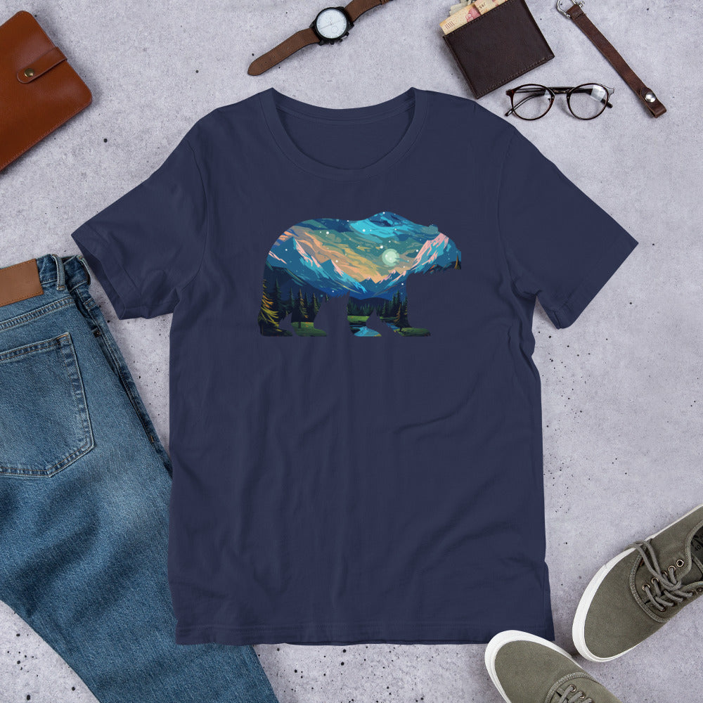 A navy long sleeve shirt with a silhouette of a bear with a landscape done in blue colors